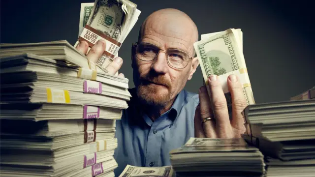Movie money stacks held by an actor in a movie productionand Replica Banknotes in Modern Film Sets